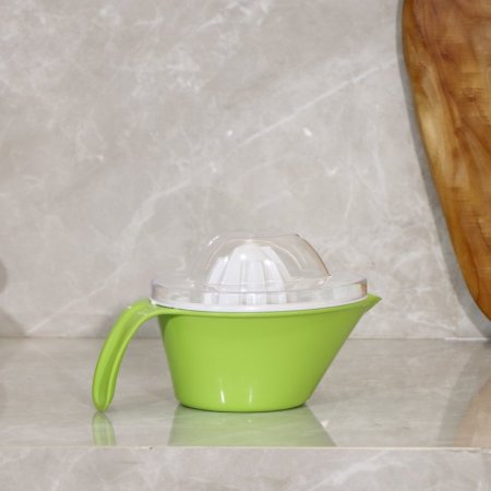 عصارة ليمون حمضيات بلاستك ملون بيد EL170/1 =رم5