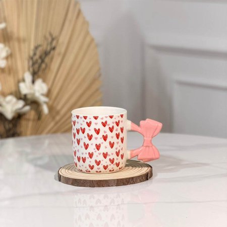 ماغ بورسلان ابيض مرسم قلوب  يد ببيونة ملون A301/5=و1