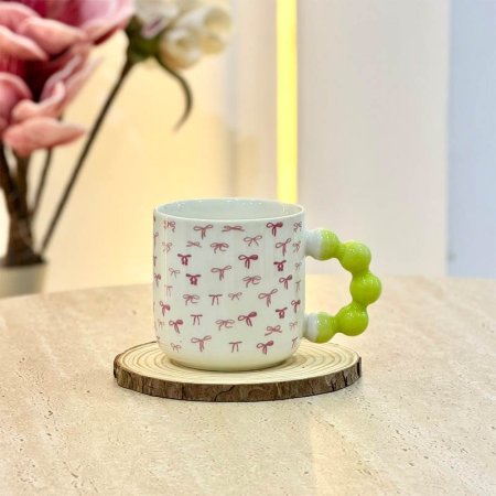 كاسة ماغ بورسلان ابيض رسمة فيونكة يد ببلز اخضر GF4/46 =ب5
