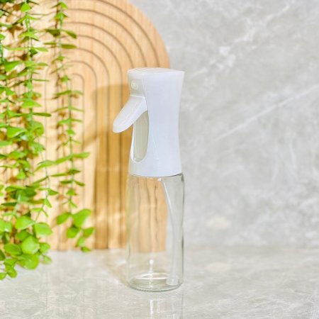 مرش قنينة زيت زجاج مدور غطا بلاستك ضغط K135/13 =ض10م
