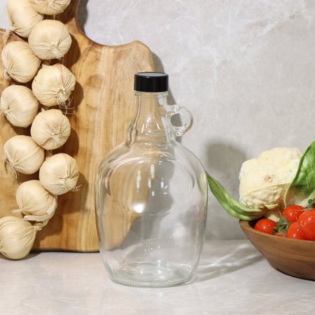 قنينة زيت زجاج نمرة 4 شكل برميل بيد غطا بلاستك لف EL130/5 =ط57